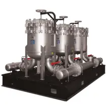 three large metallic canister filtration systems