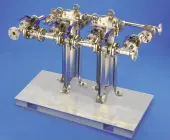 Two filters with custom piping and a skid plate for easy installation. customskid